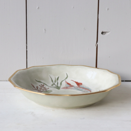 Vintage schaal met vissen