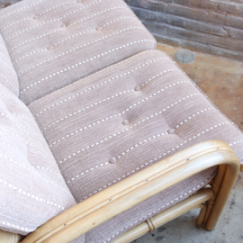 Vintage rotan bank met kussen