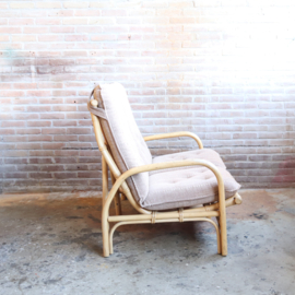 Vintage rotan bank met kussen