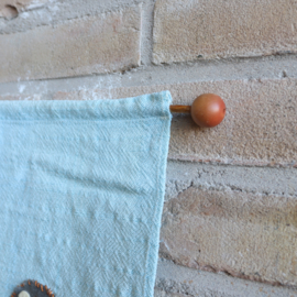 Vintage wandkleed blauw met hondje kinderkamer