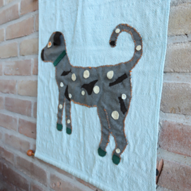 Vintage wandkleed blauw met hondje kinderkamer