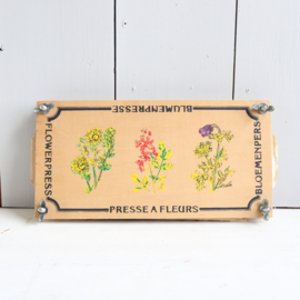 Vintage bloemenpers