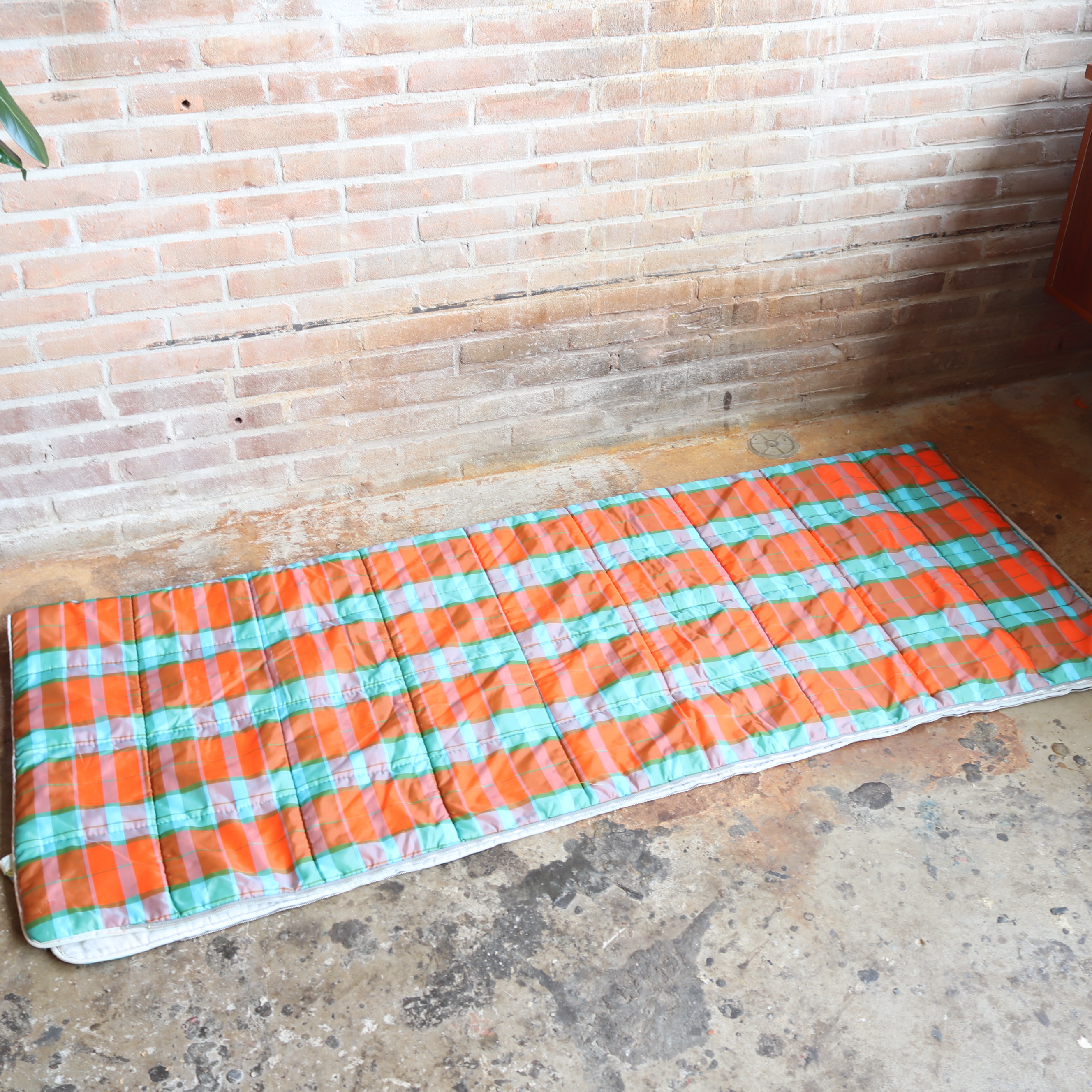 Vintage slaapzak oranje ruit
