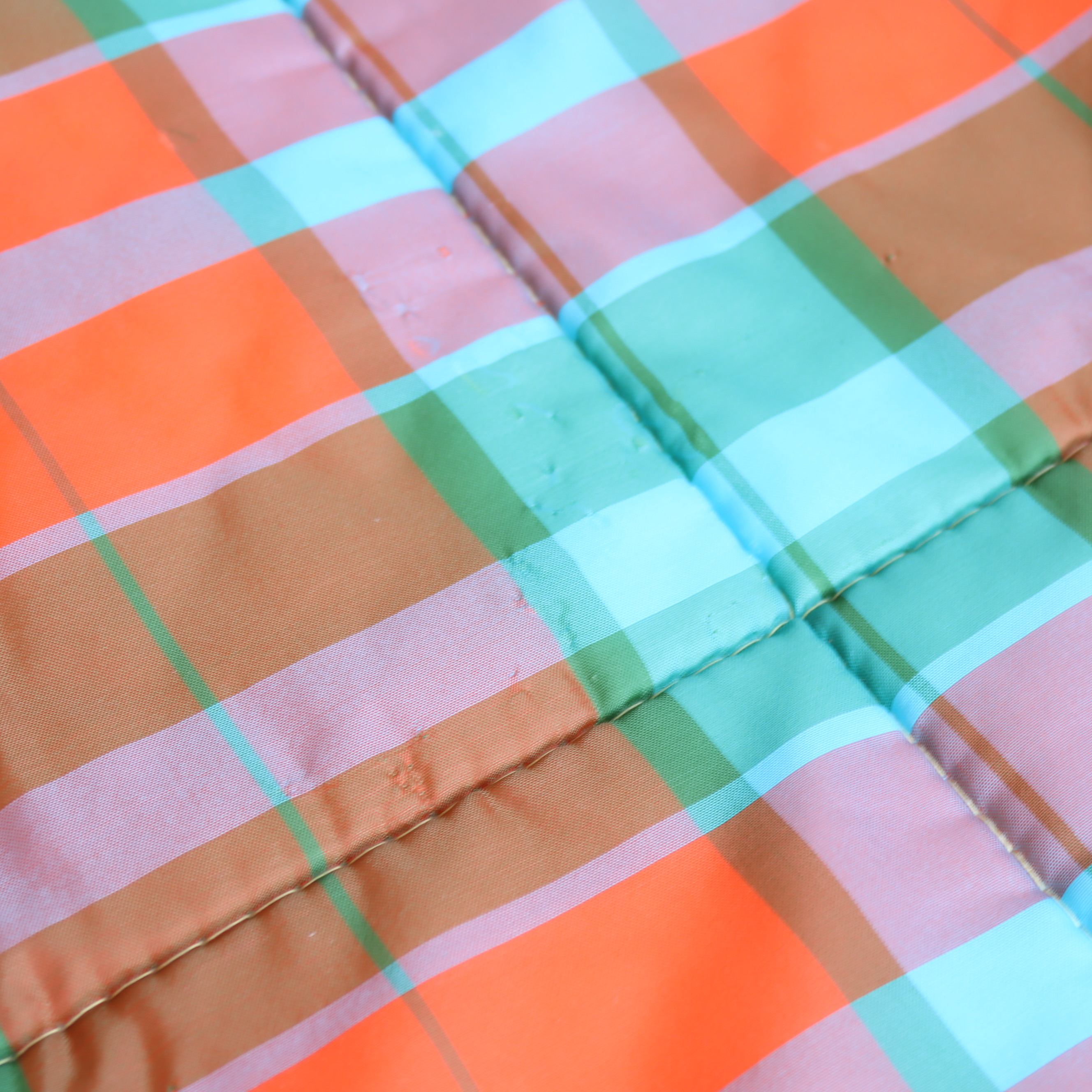 Vintage slaapzak oranje ruit