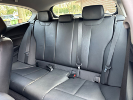 Bmw 1-serie 114i Upgrade Edition | Airco | Xenon | PDC | Navigatie |