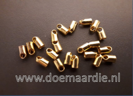 Eindkapje met oogje, ook per 50 stuks. 3mm. goud