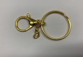 Grote sleutelhangerring met karabijn en kettinkje. Goud