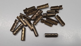 Nestel, veterpinken, antiek messing (brons kleur) , lengte 20 mm, per 10