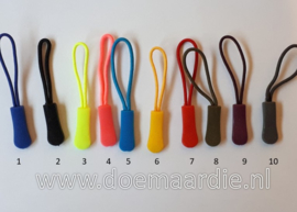 Zipper cord ends. Rits eindjes.