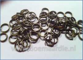 Split ringetje, dubbele ringetje, oud brons. binnen 6 mm  (ong.135)