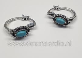 Prachtige oorbel met turquoise steentje