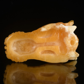 Draken skull oranje calciet +/- 7,5 cm