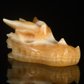 Draken skull oranje calciet +/- 7,5 cm