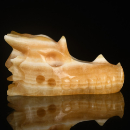 Draken skull oranje calciet +/- 7,5 cm