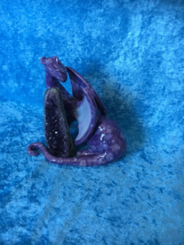 Purple dragon with a beautiful amethist