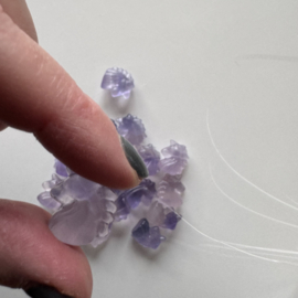 Tiny eenhoorntje van fluoriet - lavendel licht