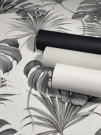 Behang met tropische bladeren