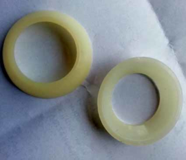 Two NOS nylon bearings