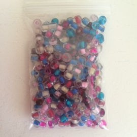 R60- 20gram glazen rocailles 4mm kleurenmix transparant met kleurkern