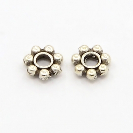 C149- ca. 150 stuks metalen mini spacers 4.5x1.5mm zilverkleur