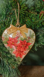 Metalen hart met Kerstster en witte achtergrond