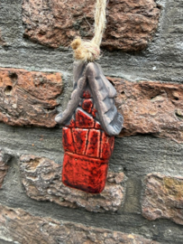 Rood keramiek huisje