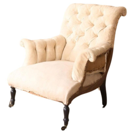 Oude Napoleon III buttoned Fishtail armchair op wieltjes.