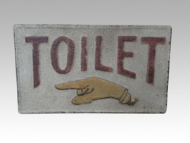 oud metalen tekstbord toilet