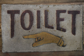 oud metalen tekstbord toilet