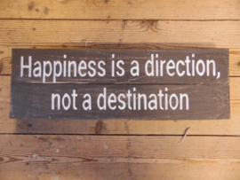 Tekstbord "happiness is a direction.."