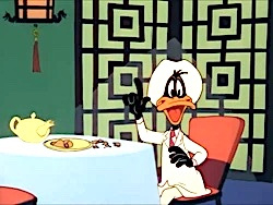 Nr.0442 --16mm Looney Tunes Warner Bros ,,China Jones - Looney Tunes Cartoon met Daffy Duck, mooi van kleur en Engels gesproken op 120m. spoel en in doos