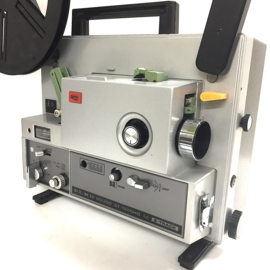 Nr.8858 -- Elmo ST-1200 HD 2-track voor Super 8 mm films, 150 watt halogeenlamp, geschikt VOOR 360 METER spoelen, 15W.zware versterker zeer solide projector heeft service/revisie beurt gehad en werkt prima