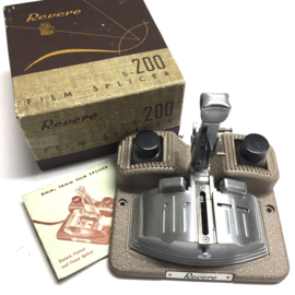 zeldzame plakpers van Revere film splicer S-200 uit de jaren '60 voor 8/16mm films,met orginele doos en handleiding als nieuw verzamel object