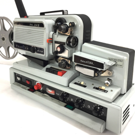 Nr.8888 -- Heurtier P6-24 Bi-Film super8/dubbel8 film met geluidsunit, halogeenlamp, deze projector is echt voor de gevorderde filmer, heeft service beurt gehad en werkt naar behoren zowel beeld als geluid,met orginele handleiding