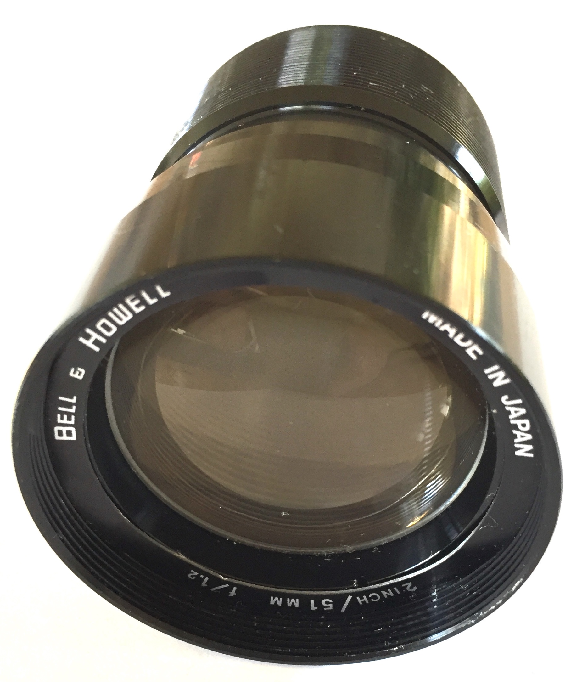 PL057-- 16mm  Bell Howell basis lens kleur zwart lichtsterke lens 1:1.2. -51mm,  doorsnee 52.5mm schroef, lichtsterke lens is in prima staat