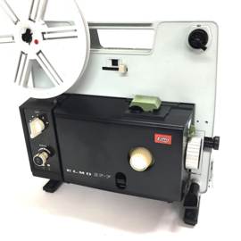 Nr.8729 -- Elmo SP-FP  voor dubbel8 en super8 films zonder geluid, lens: Elmo Zoom Lens f: 1,3 F: 15-25 mm halogeen lamp: 21 V, 150 W ,variabele snelheid (14-24 fps)gelijkstroommotor, heeft service beurt gehad en werkt goed