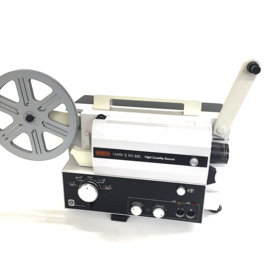 Nr.8902 -- Eumig Mark S 810 High Quality Sound  Lux voor Super 8 mm film met of zonder geluid ,licht sterke lens: Eumig Suprogon Zoom f : 1.2 F : 12,5-25 mm lamp : 100 W , 12 V  versterker: 2-6 W,  heeft service beurt gehad en werk prima