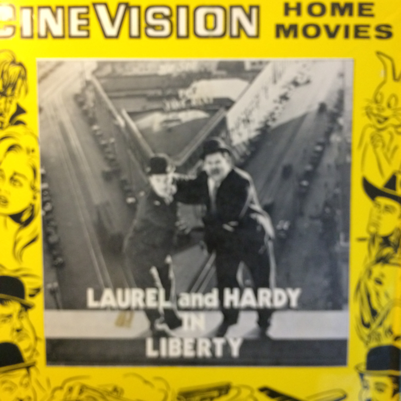 Nr.6534 -- Super 8 SILENT-- Laurel en Hardy Liberty, zwartwit Silent op 120 meter spoel en in orginele fabrieks doos