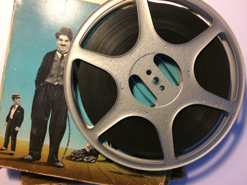 Nr.1228--9,5mm speelfilm-Chaplin a Woman    , comedy , zwartwit silent bestaat uit 2 delen van ca.120 meter in orginele Film Office dozen