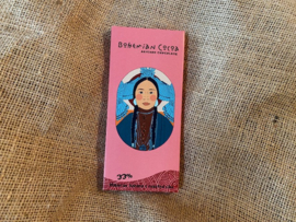 Chocoladereep 33% cacao met hibiscus, banaan & geroosterde nibs