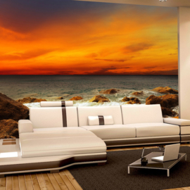 Fotobehang poster 0060 natuur strand zonsondergang oranje lucht rotsen