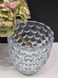 Vaas met lensglaasjes