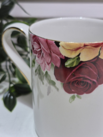 Mok met roos decoratie