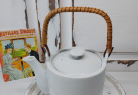 Witte porseleinen theepot