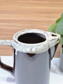 Kan met druipglazuur