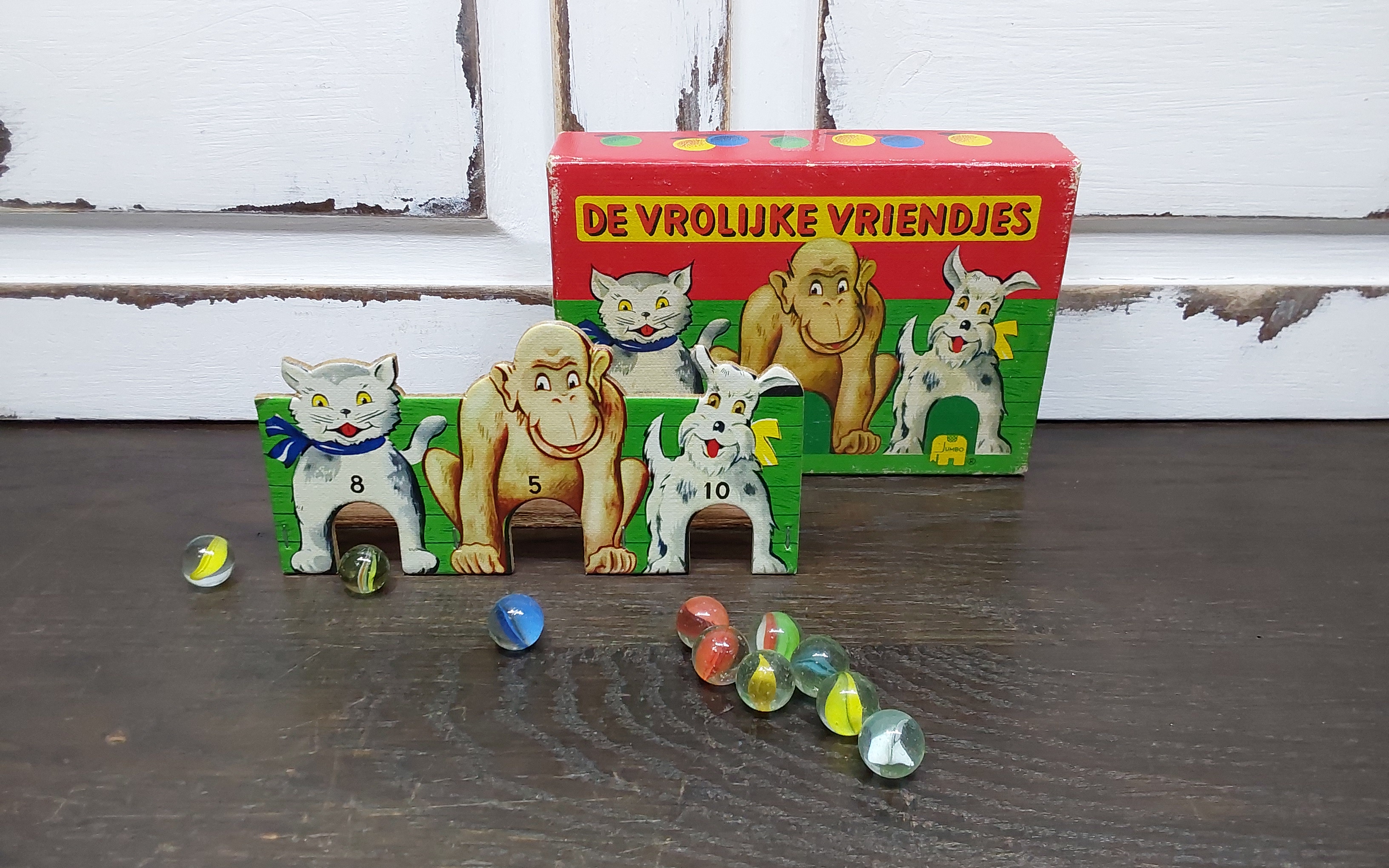 Vrolijke vriendjes knikkerspel