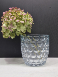 Vaas met lensglaasjes