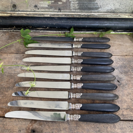 OV20110841 Set of 10 old French knives with presumably ebony handle and stainless steel blade marked - J.Rigault Melun - in beautiful still usable condition! Size: 25 cm. long / 2 cm. wide.