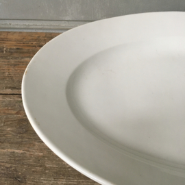 AW20110669 Large French serving dish of heavy quality porcelain. Made in Paris and in perfect condition! Size: 49.5 cm. long / 34 cm. cross section / 7 cm. high.