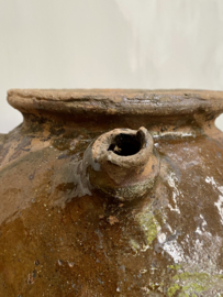 AW20110934 Large antique southern French 18th century walnut oil jug from the Périgord region in beautiful earthy colours. In beautiful weathered condition! Size: 33 cm. high / +/- 33 cm. cross section (up to the handles). Pickup at shop only.